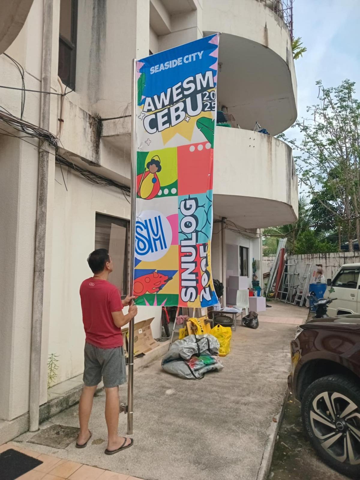 Awesome Cebu 2025 feather banner project by Sky Graphix Digital Solutions