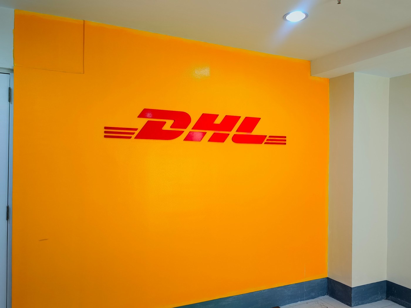 DHL wall logo sign by Sky Graphix Digital Solutions
